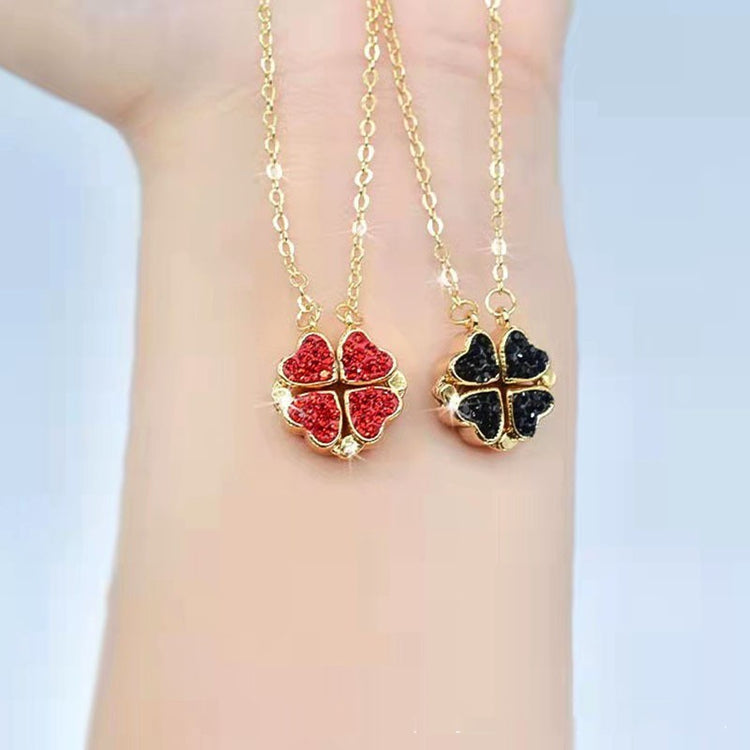 a hand with a necklace on it