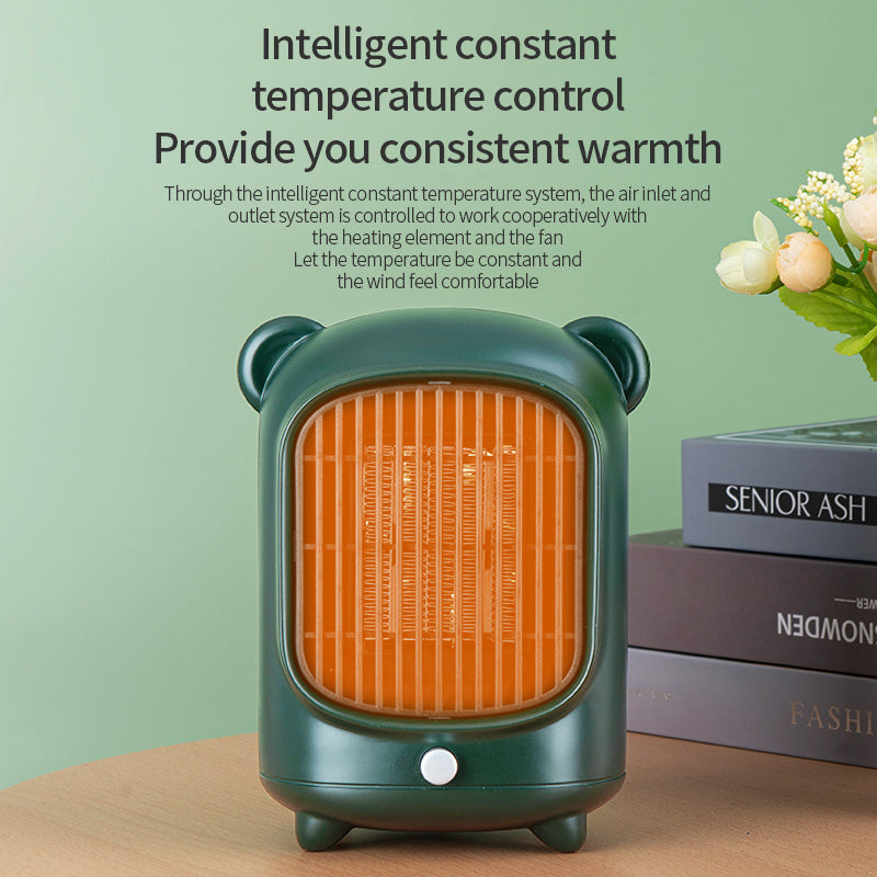 a small green heater next to a stack of books