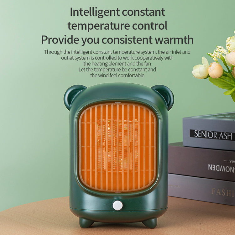 a small green heater next to a stack of books