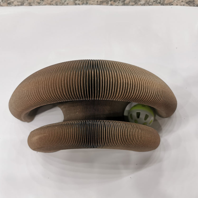 a brown object with a ball