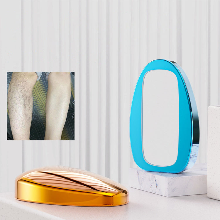 a blue and gold object on a white surface