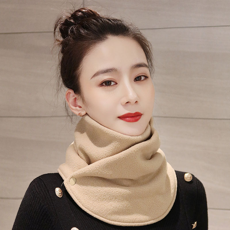 a woman with a scarf around her neck