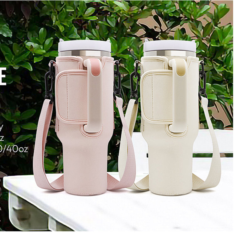 two cups with straps on a table