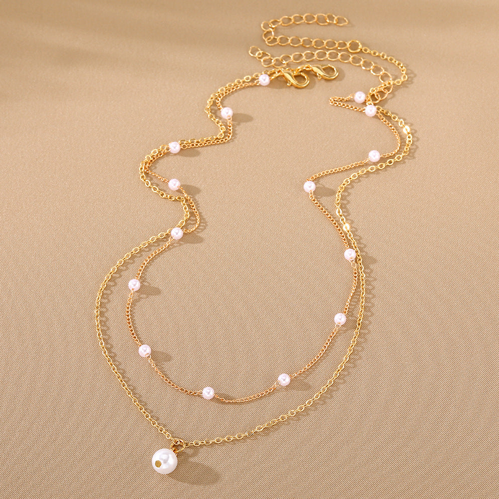 a necklace with pearls on it