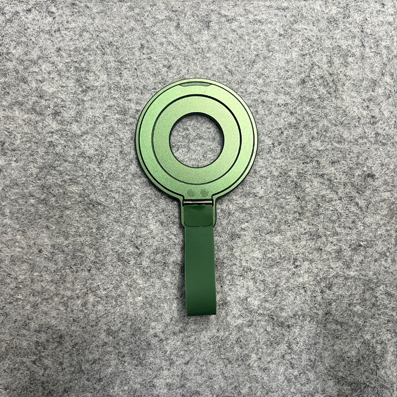 a green round object with a strap