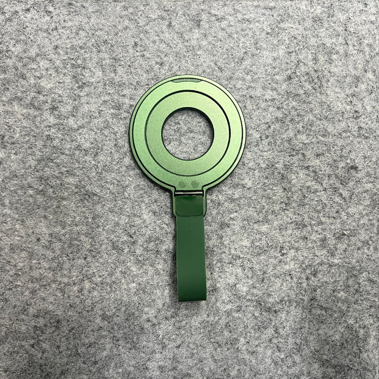 a green round object with a strap