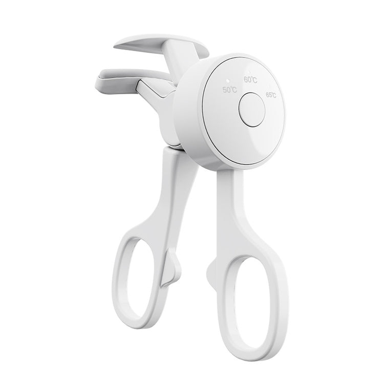 a white scissors with a round circular object