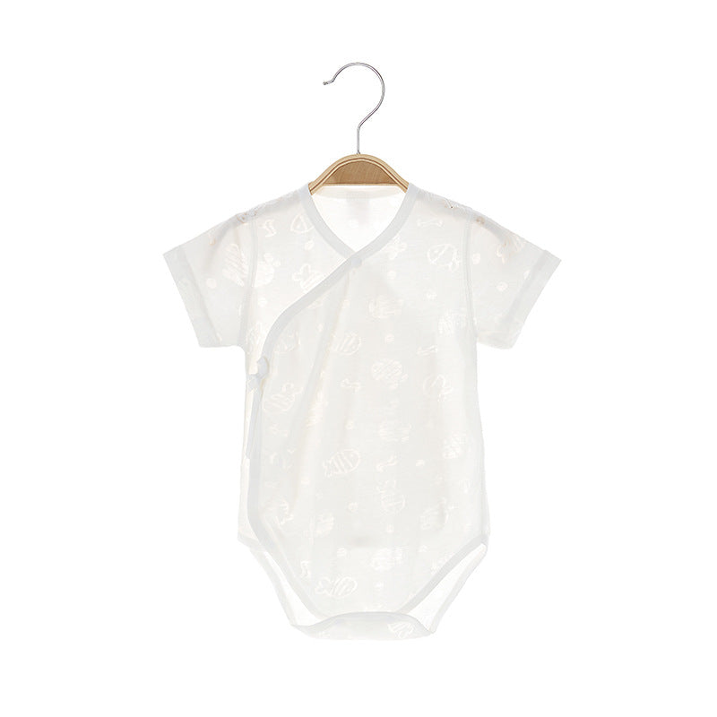 a white baby clothes on a swinger