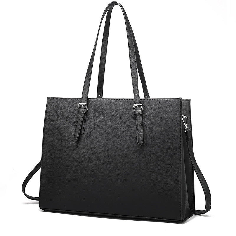 a black purse with straps
