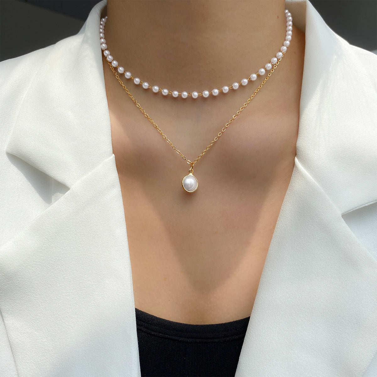 a person wearing a necklace