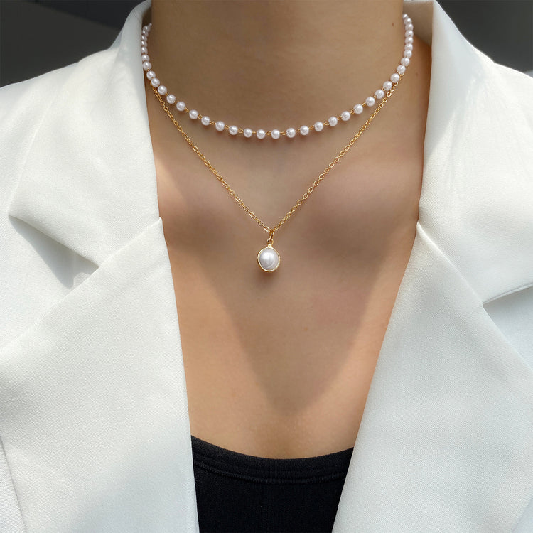 a person wearing a necklace