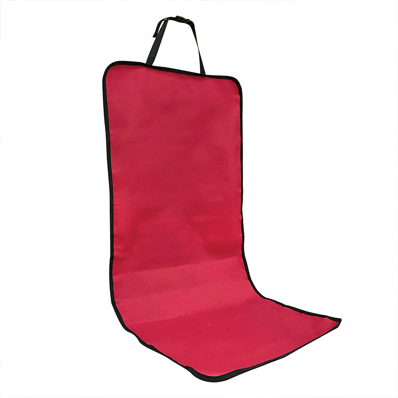 a red folding chair with black trim
