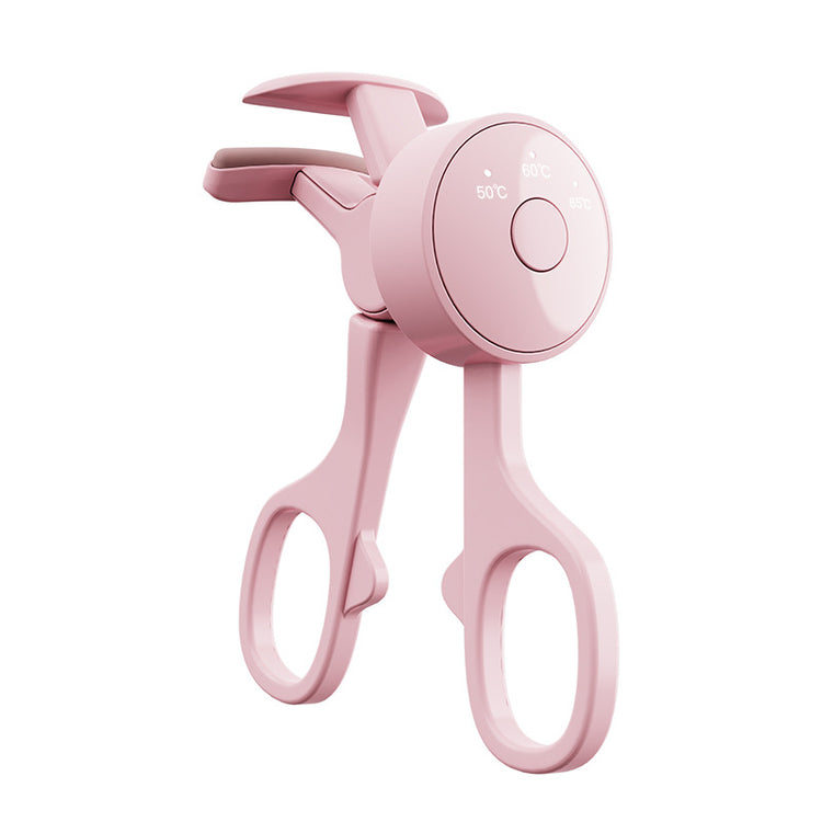 a pink scissors with a round circular object