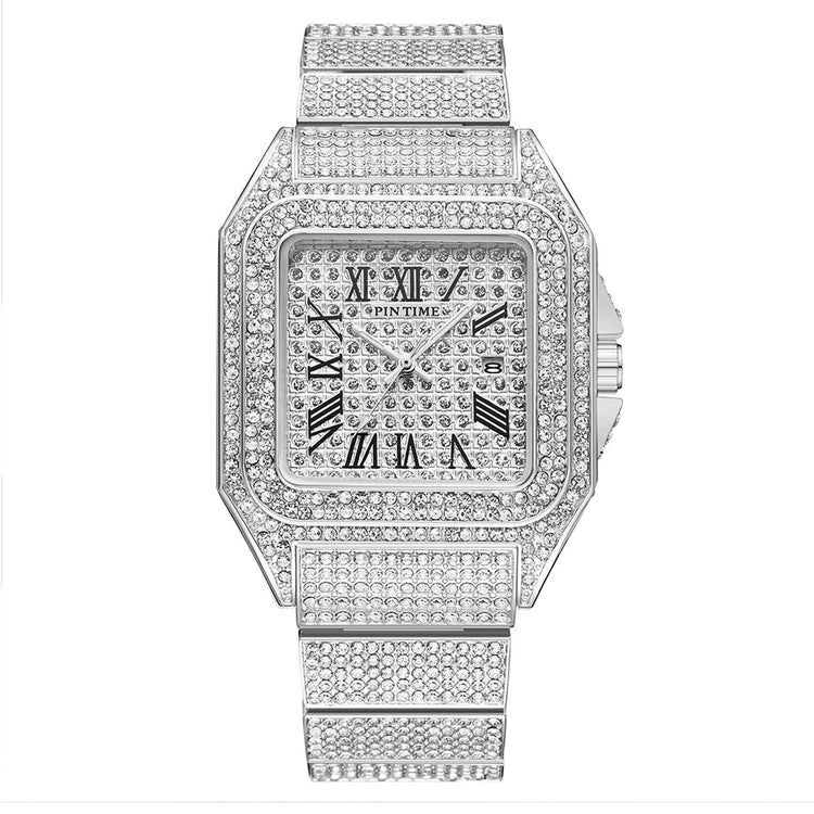 a silver watch with diamonds