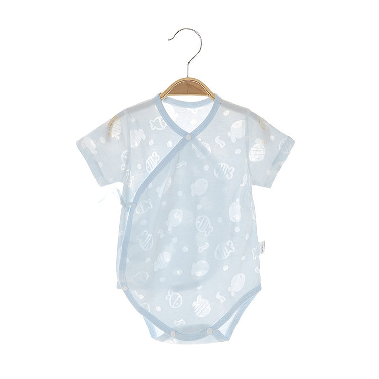 a baby clothes on a swinger