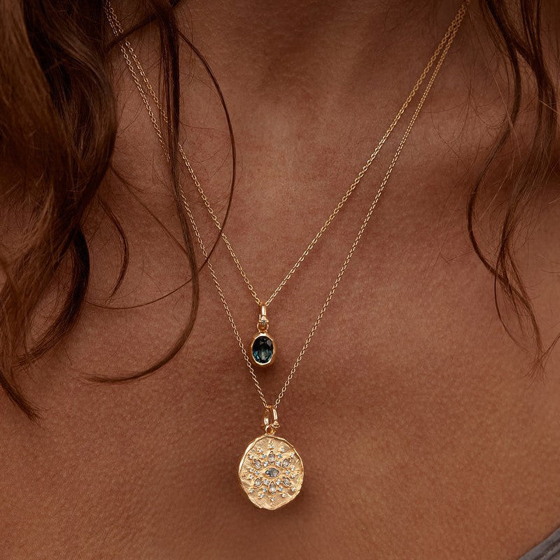 a woman wearing a necklace