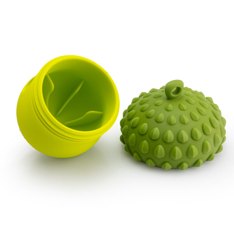 a green ball shaped container with a lid