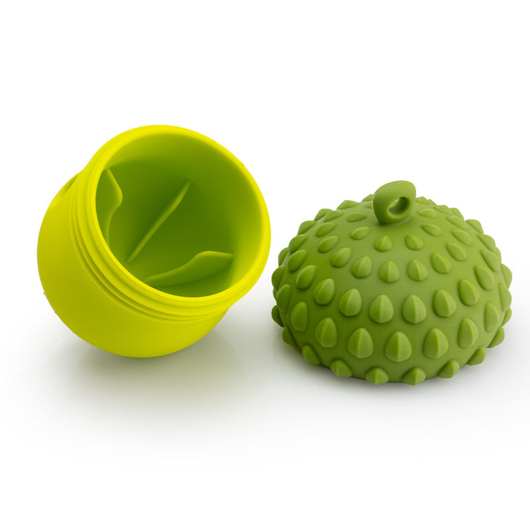a green ball shaped container with a lid