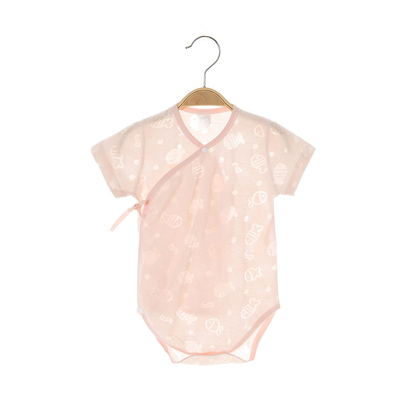 a pink baby clothes on a swinger