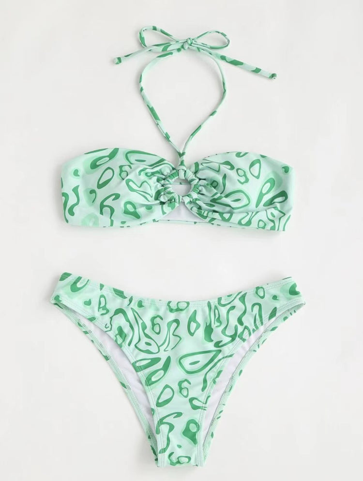 a green garment with a white background