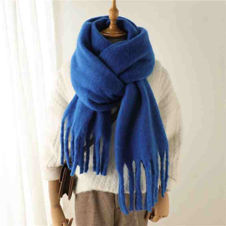 a blue scarf on a mannequin