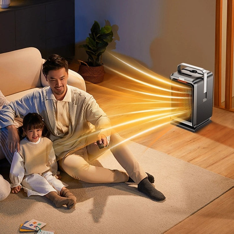 a man and a child sitting on the floor with a portable heater