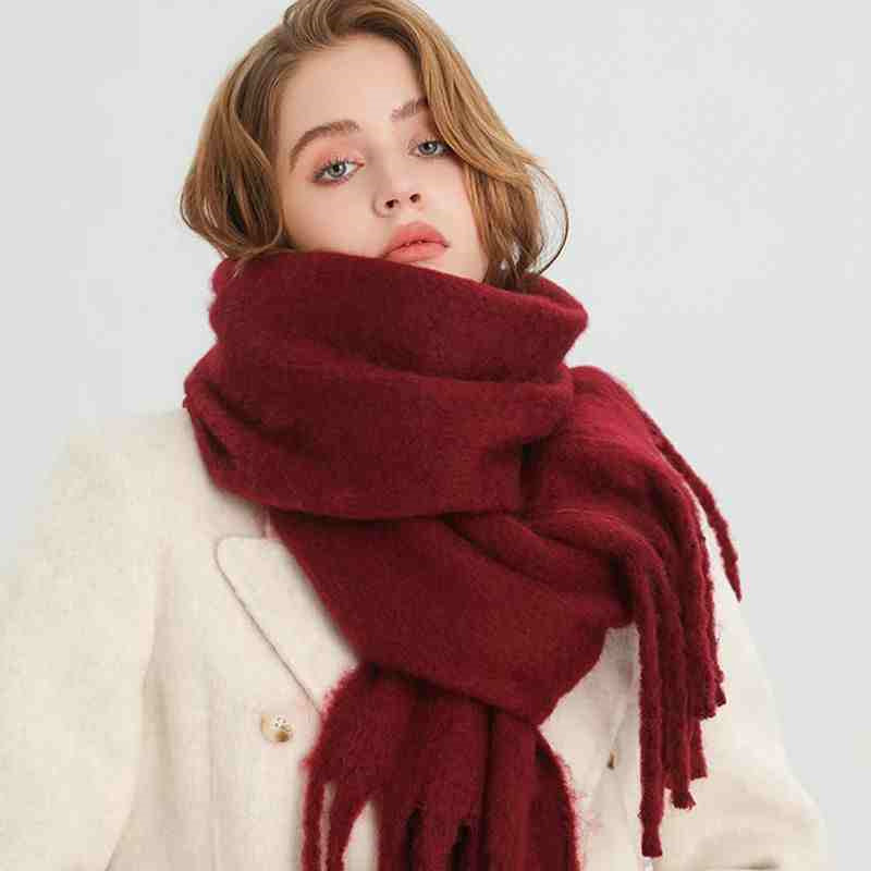 a woman wearing a scarf