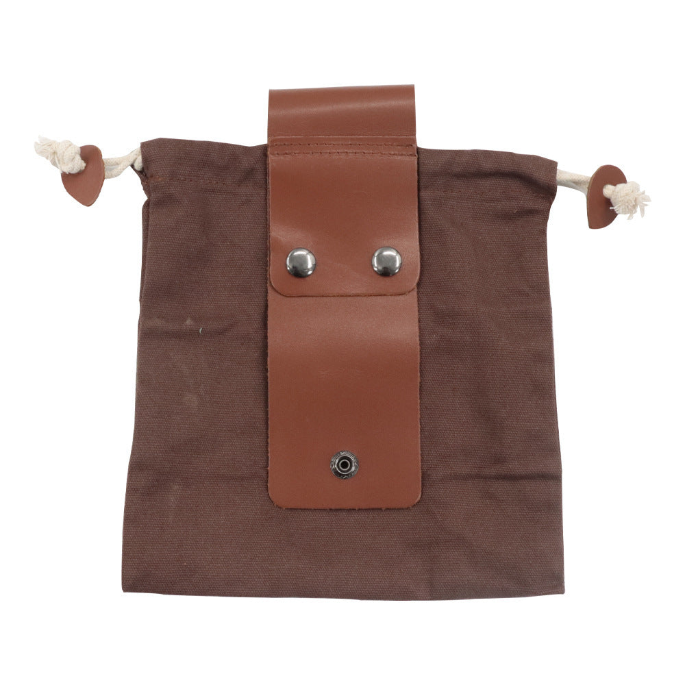 a brown bag with a leather strap