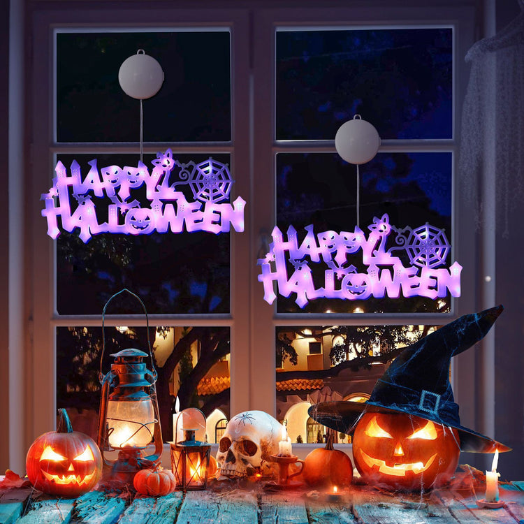 a pumpkins and candles on a table