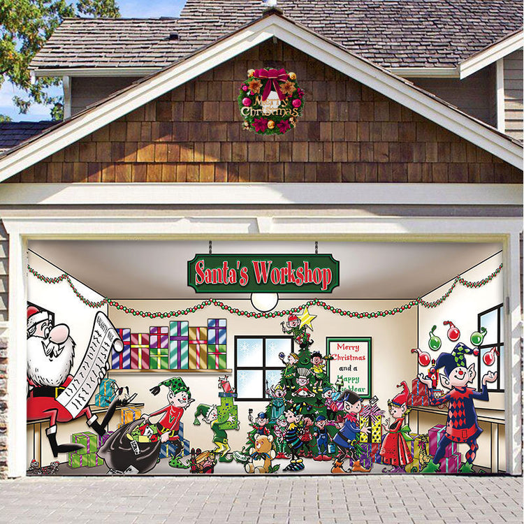 a garage door with a painting of santa's workshop