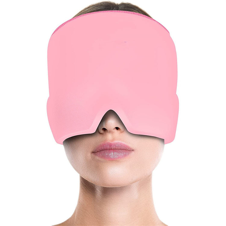 a woman with a pink mask over her eyes