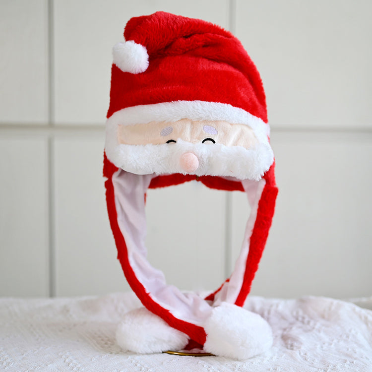 a red and white hat with a face