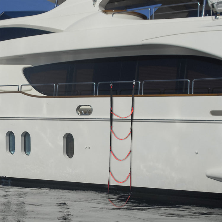 a white boat with a rope attached to the side