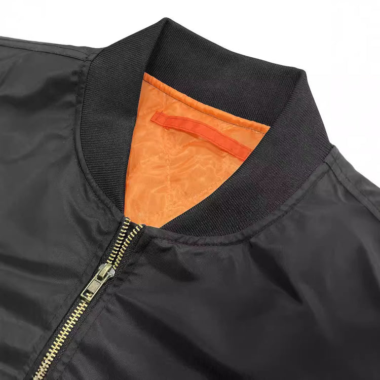 a black jacket with orange inside