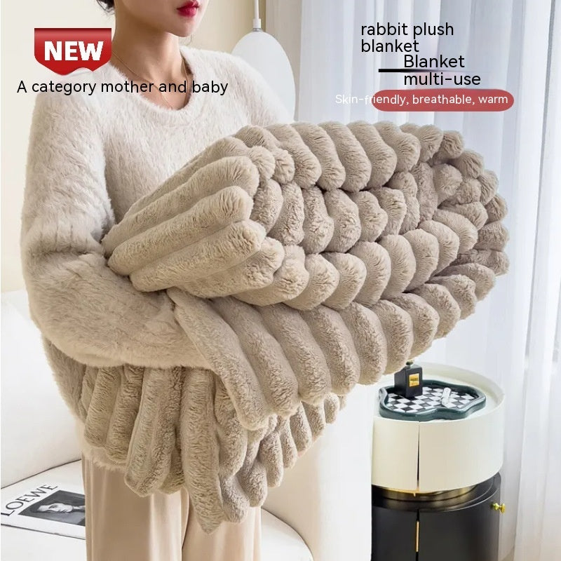 a woman holding a blanket