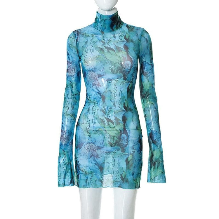 a mannequin wearing a blue dress