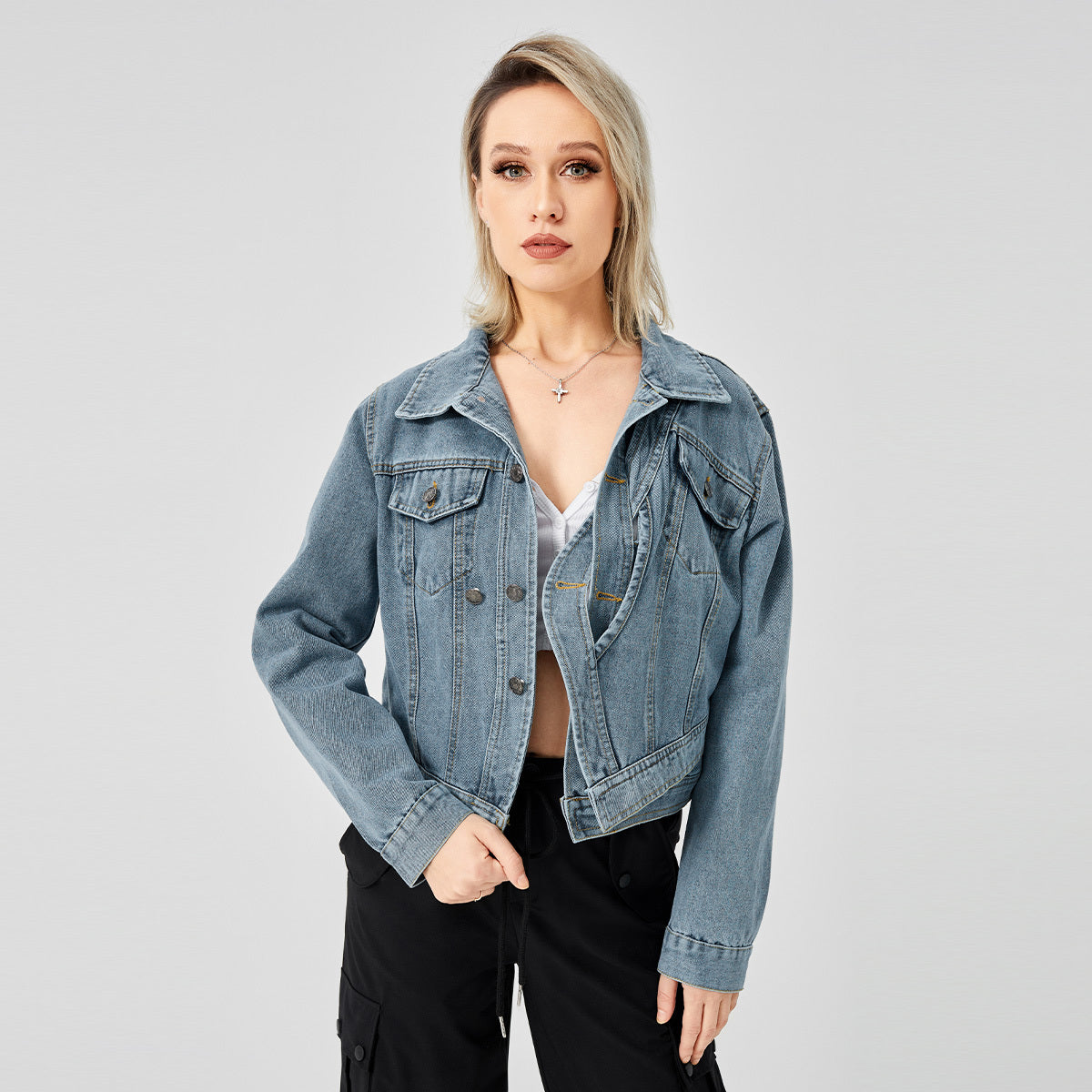 a woman in a denim jacket
