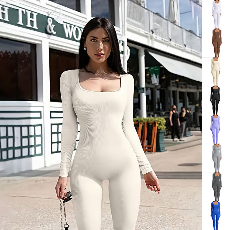 a woman in a white jumpsuit