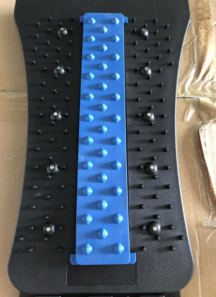 a black and blue plastic board with black pins