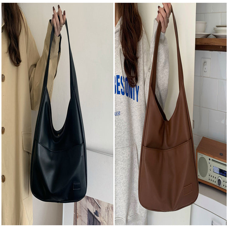 a woman holding a purse