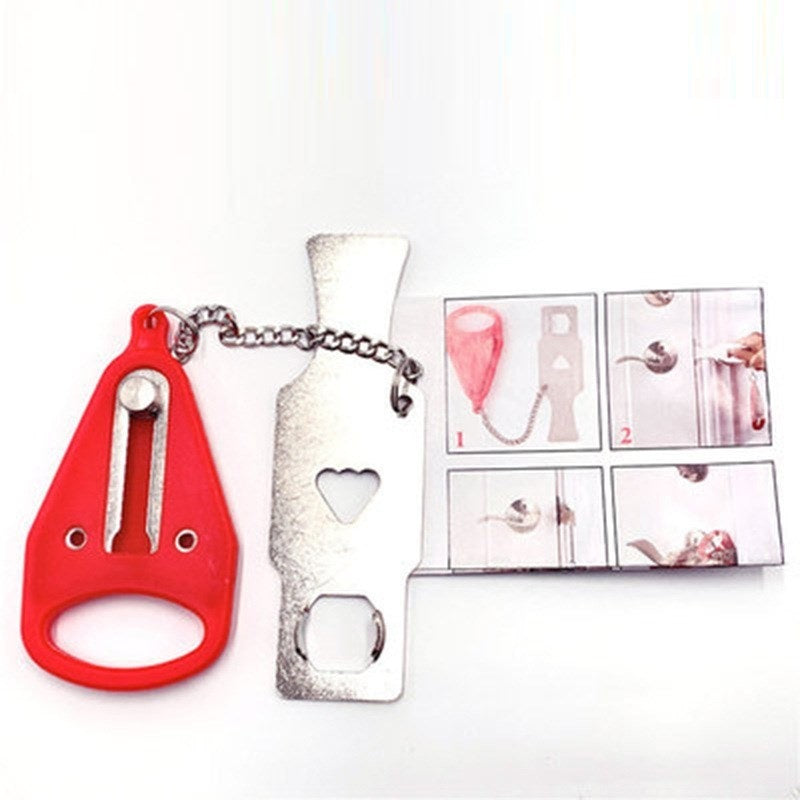 a red and silver nail clipper