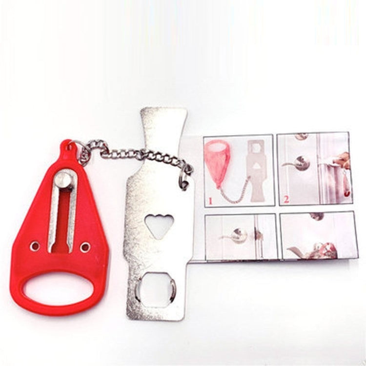 a red and silver nail clipper