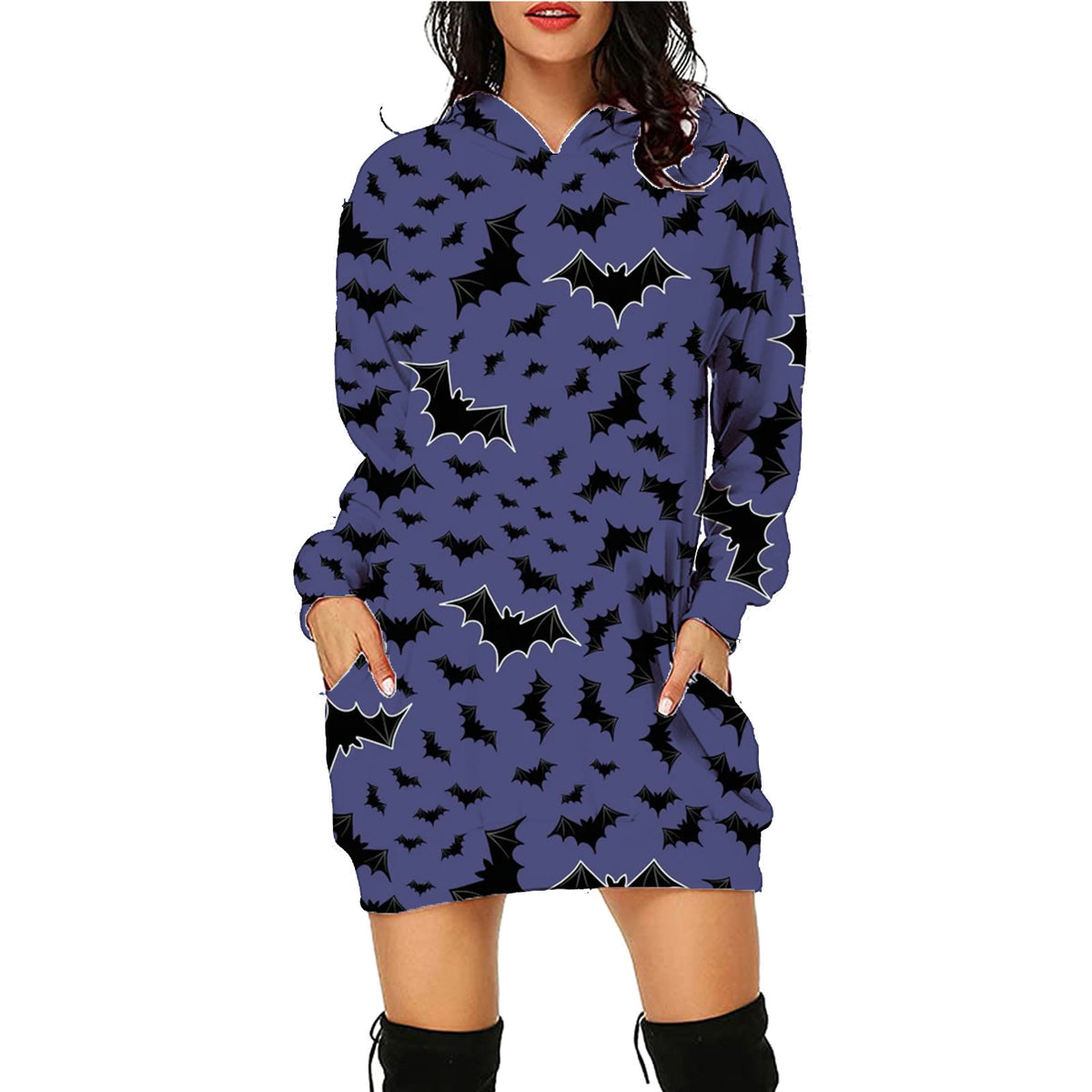 a woman wearing a blue dress with black bats on it