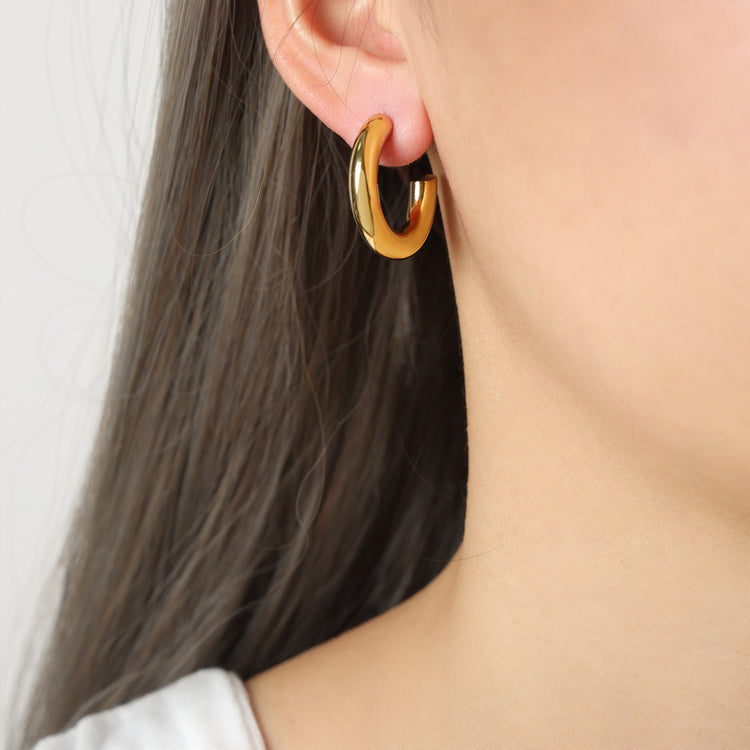 a close up of a woman's ear