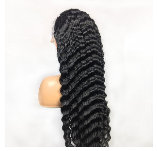 a black wig on a mannequin head