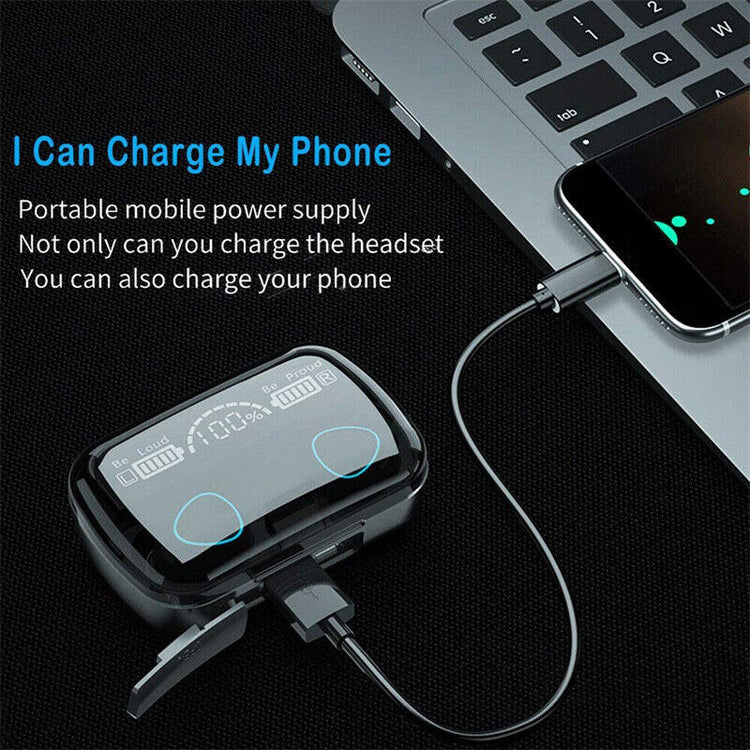 a phone charging on a laptop