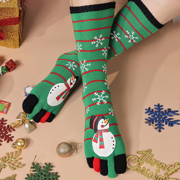 a person wearing socks with snowman and snowflakes