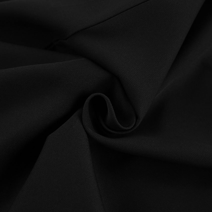 a black fabric with a wavy folds