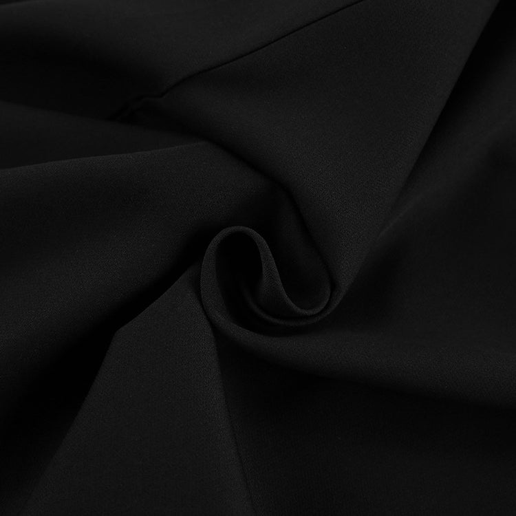 a black fabric with a wavy folds