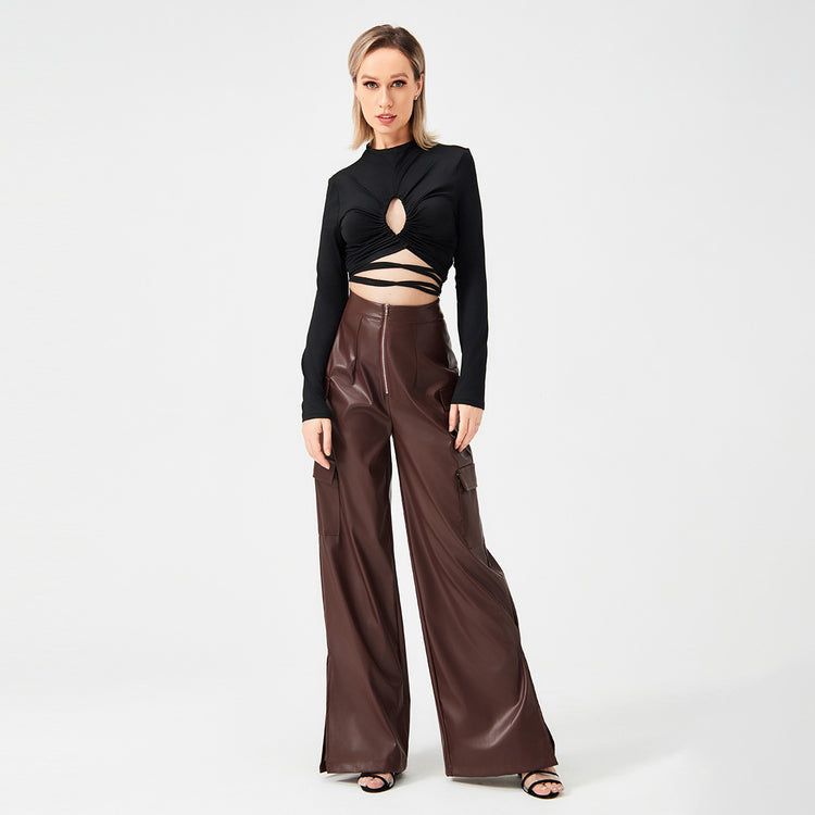 a woman in black shirt and brown pants